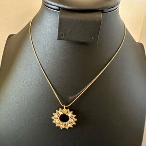 Gold tone wreath shape charm necklace